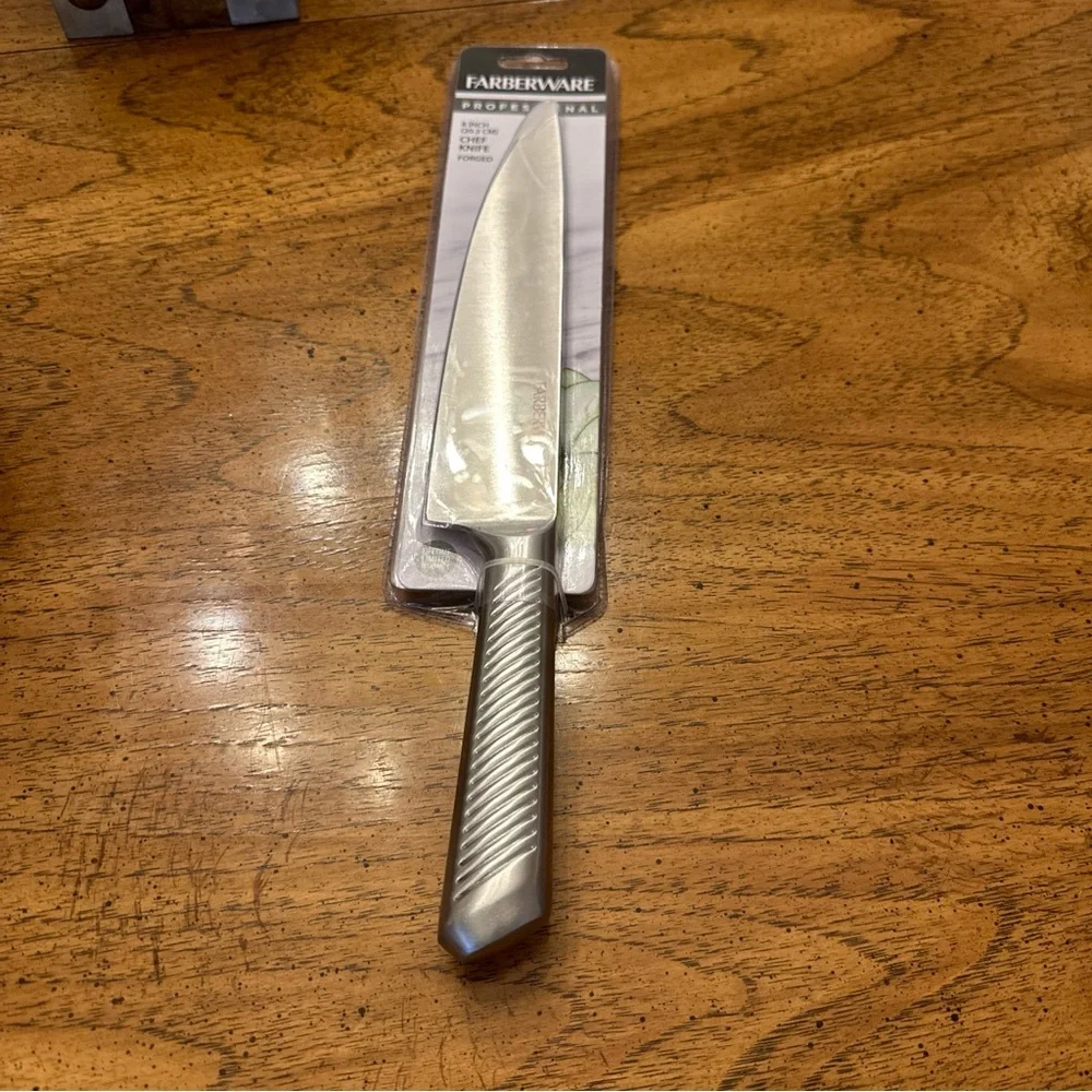 New with tags Farberware chef knife 8 inch blade